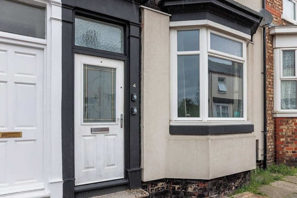 A charming and welcoming entrance with a traditional exterior and convenient access to the home.