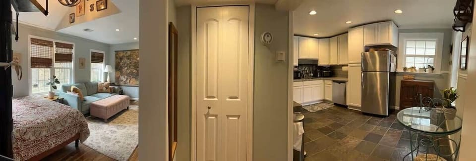 Wide-Angle View of Hallway, Living/Bedroom and Kitchen