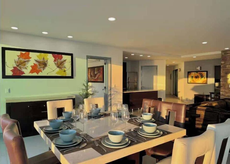 Stylish dining table set for gatherings in a warm, open living space