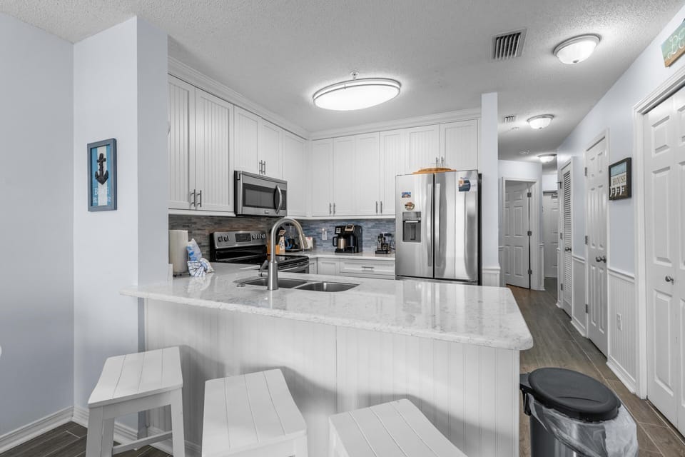 Condo, Multiple Beds (The Dunes 101) | Private kitchen | Oven, toaster