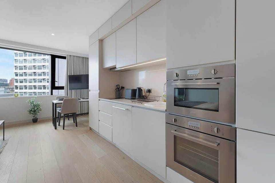 Kitchen equipped with all essentials, including, oven, fridge and full cookware set.