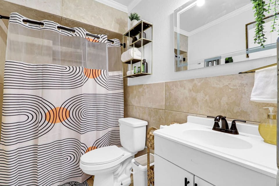 Spacious Bathroom/ Towel Rack / Vanity / Shower Area