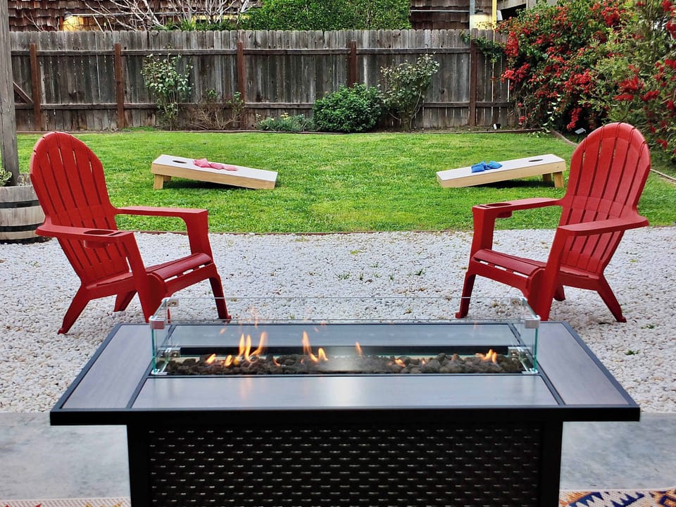Spacious back yard with fire pit area 