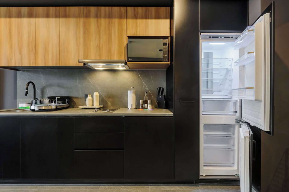 Sleek open kitchen with contemporary finishes.