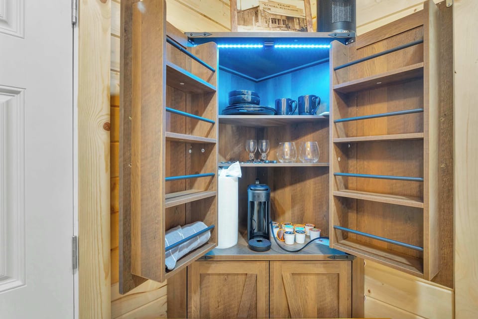 Open shelving kitchenette with coffee essentials