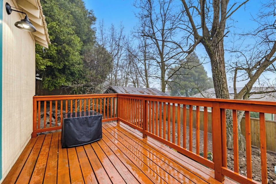 Outdoor deck seating surrounded by nature
