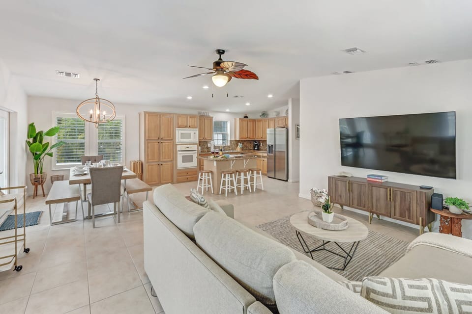 Living Room | Comfortable seating,  smart tv, open concept layout flows into dining and kitchen.