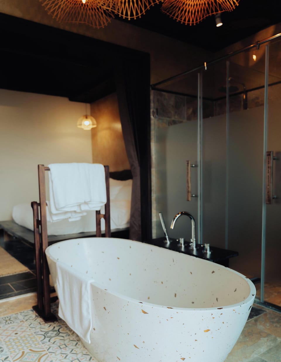 Separate tub and shower, hair dryer, slippers, bidet