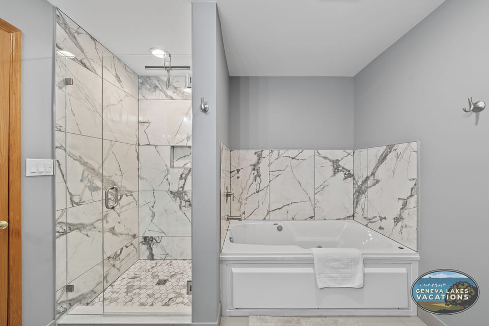 Separate shower and soaker jetted tub