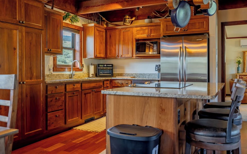 The large kitchen with island breakfast bar will be a hub of activitiy