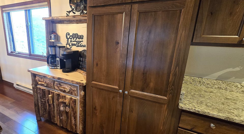 The well- appointed kitchen with granite countertops has everything you need to easily prepare meals