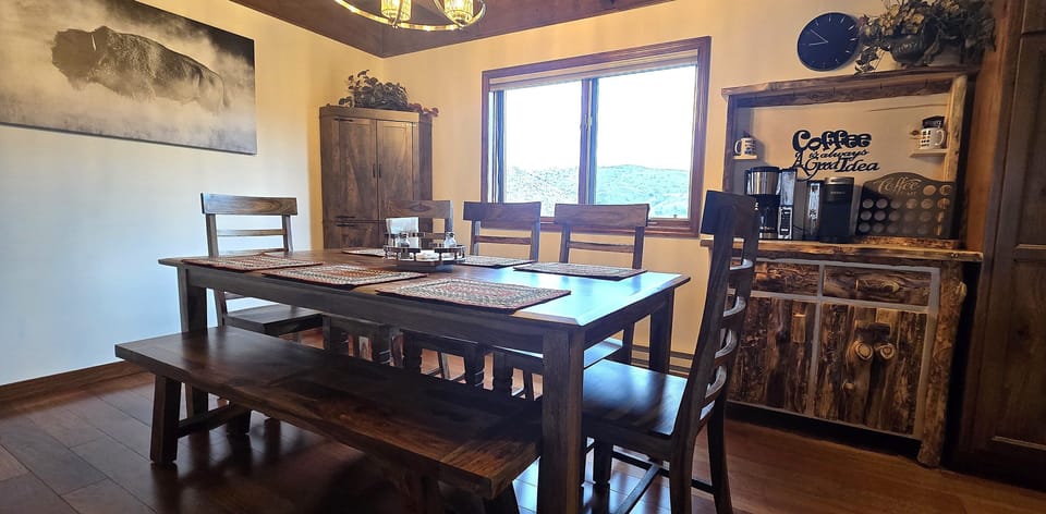 The dining room is a great space to gather together. The deck just outside has additional seating for dining al fresco.