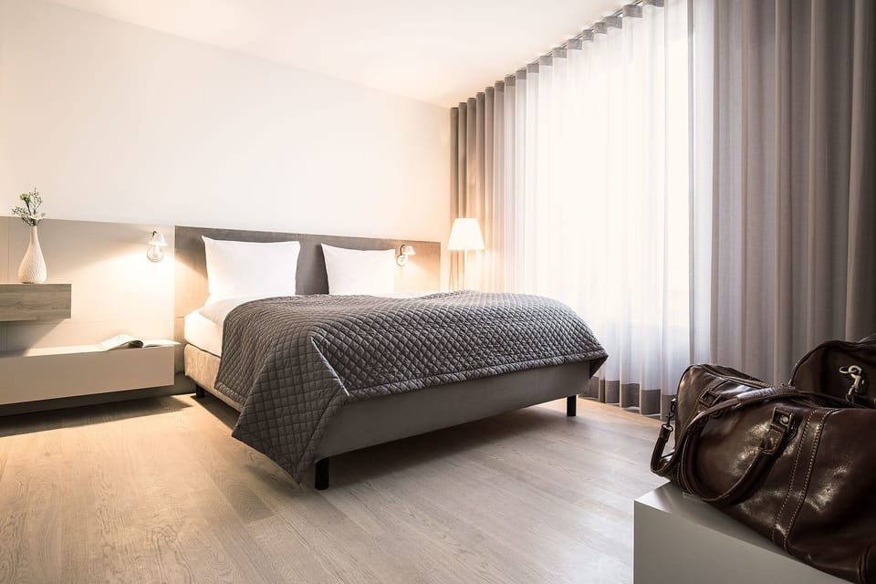 Junior Suite, 1 Bedroom | Hypo-allergenic bedding, down comforters, in-room safe, desk
