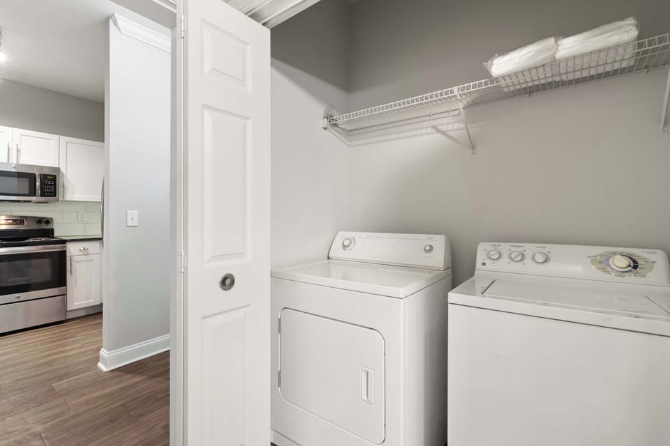 In-unit washer & dryer for ultimate convenience — perfect for long-term stays.