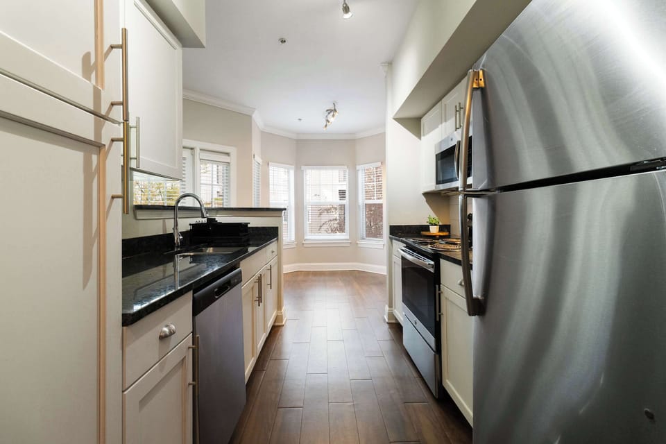 Upgraded stainless-steel kitchen appliances for a premium home-away-from-home experience.