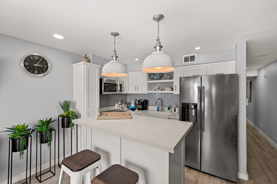 Fully equipped kitchen with modern appliances.