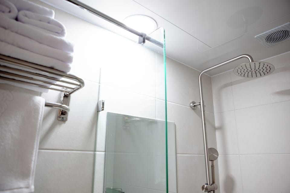 Triple Room, Non Smoking, Private Bathroom | Bathroom | Shower, hair dryer, towels, soap