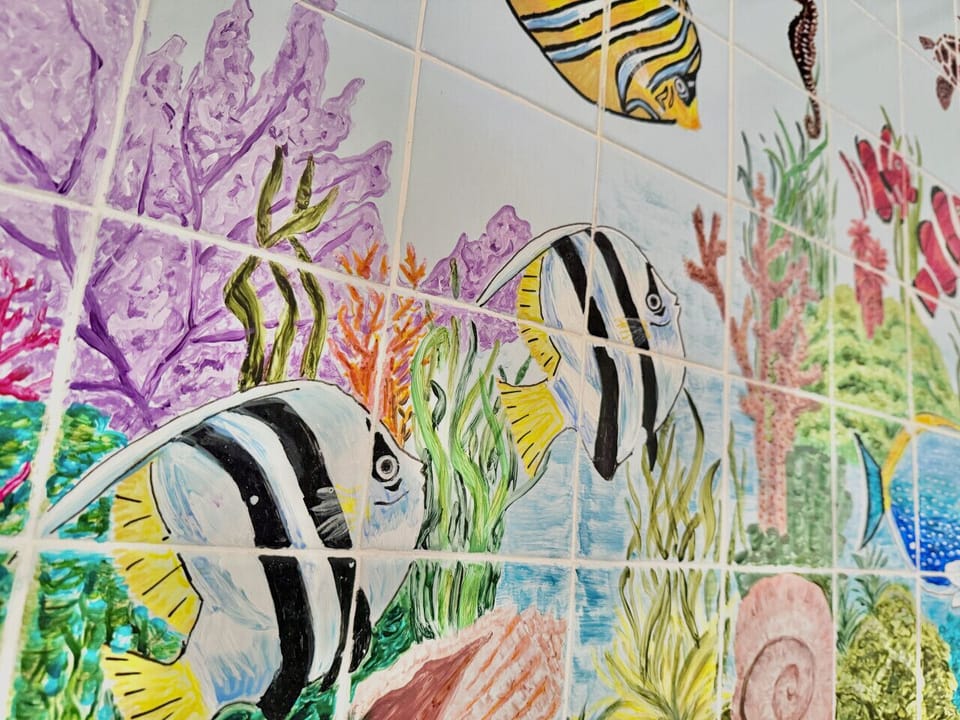 Fun ocean-inspired tile detail for a unique coastal touch.