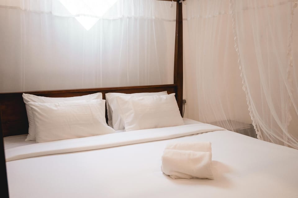 Standard Double Room | Desk, blackout drapes, iron/ironing board, free WiFi