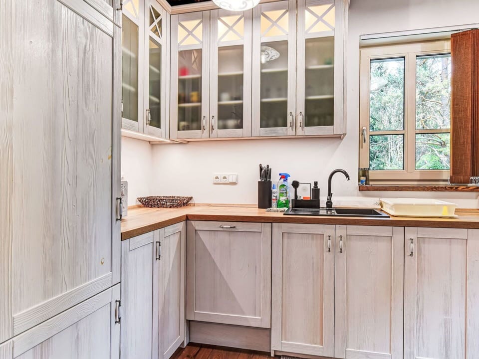 Cabinetry, Wood, Kitchen, Interior Design, Countertop, Furniture, Kitchen Appliance, Cupboard, Flooring, Drawer