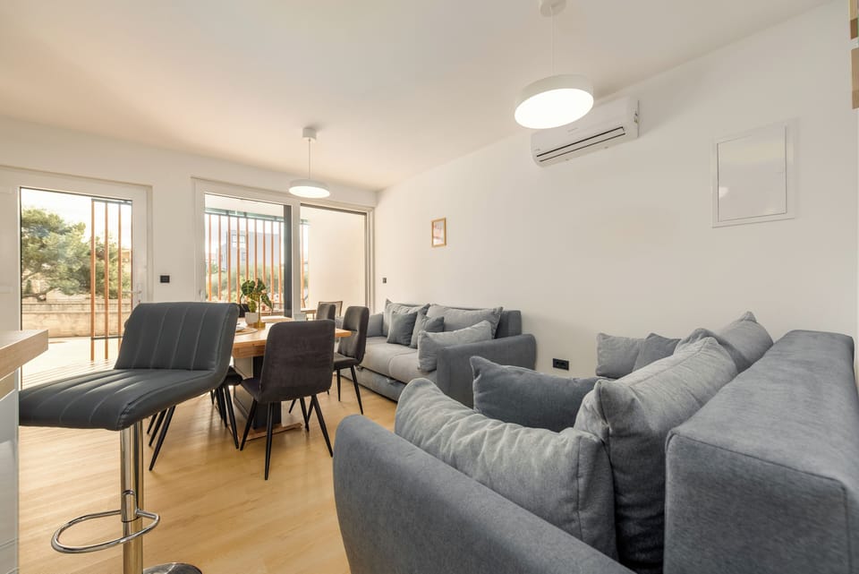 Basic House, Partial Sea View | Living area | 100-cm Smart TV with satellite channels