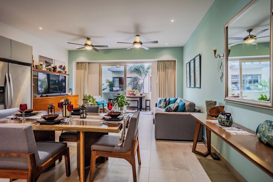 Unwind in your stylish open-plan living space where modern comfort meets warm design, perfect for entertaining or relaxing together.