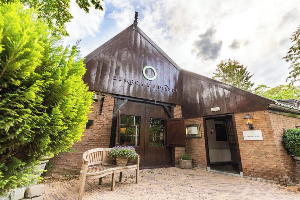 Arrive with ease at the charming, rustic hotel entrance.