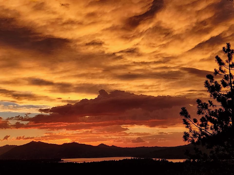 Sunset - Gorgeous Sunset from balcony with lake and slope views!