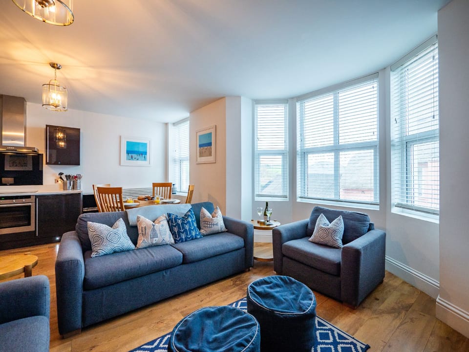 Lounge area with windows that enable a view of the sea