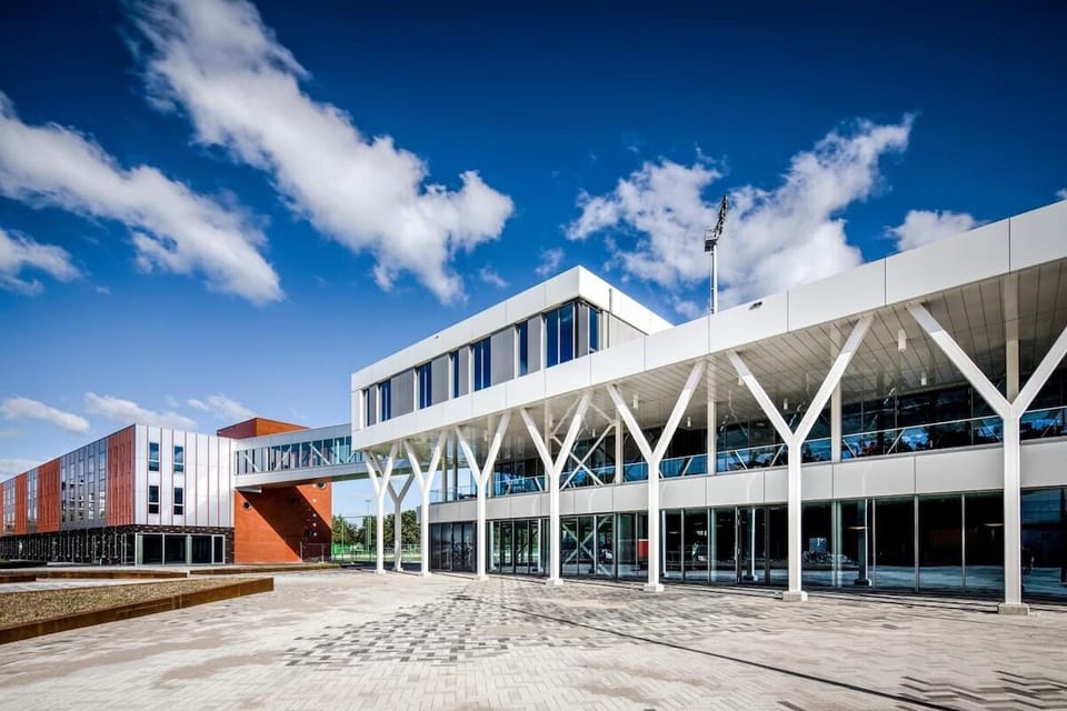 Arrive to striking modern architecture and an airy, open plaza.