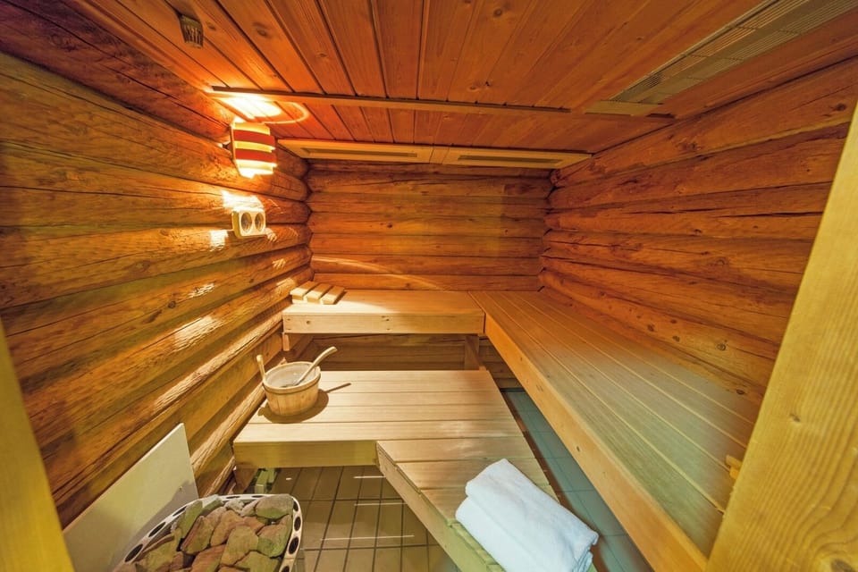Recharge in a fragrant wood sauna after a day exploring.
