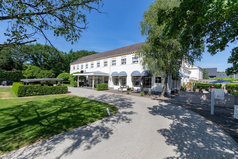 Unwind outdoors with cushioned seating and shaded relaxation.