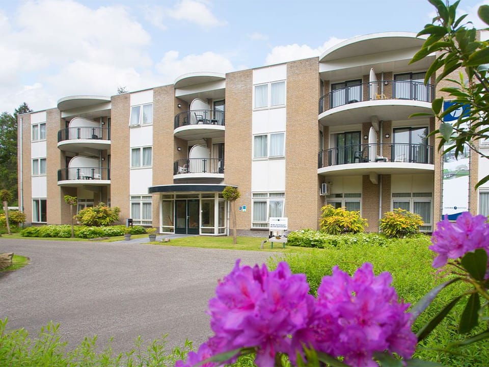 Unwind in a peaceful setting with private balconies and greenery.