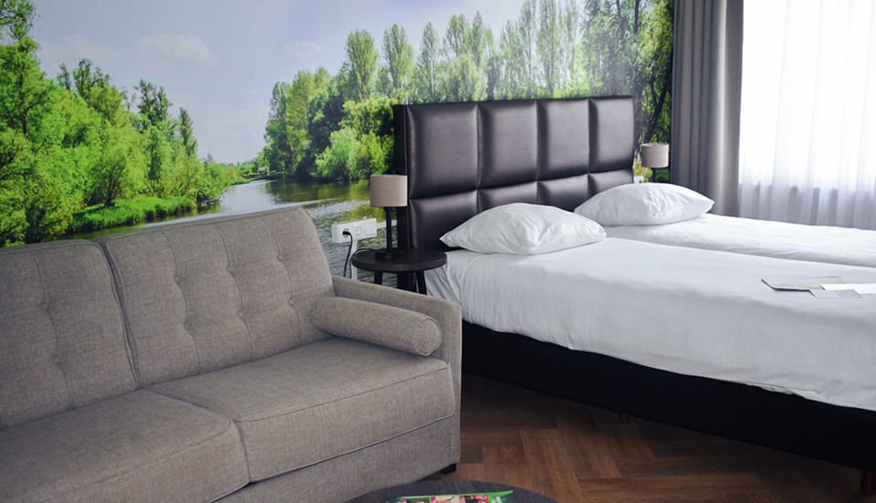 Unit with two Twin bed and a sofa bed