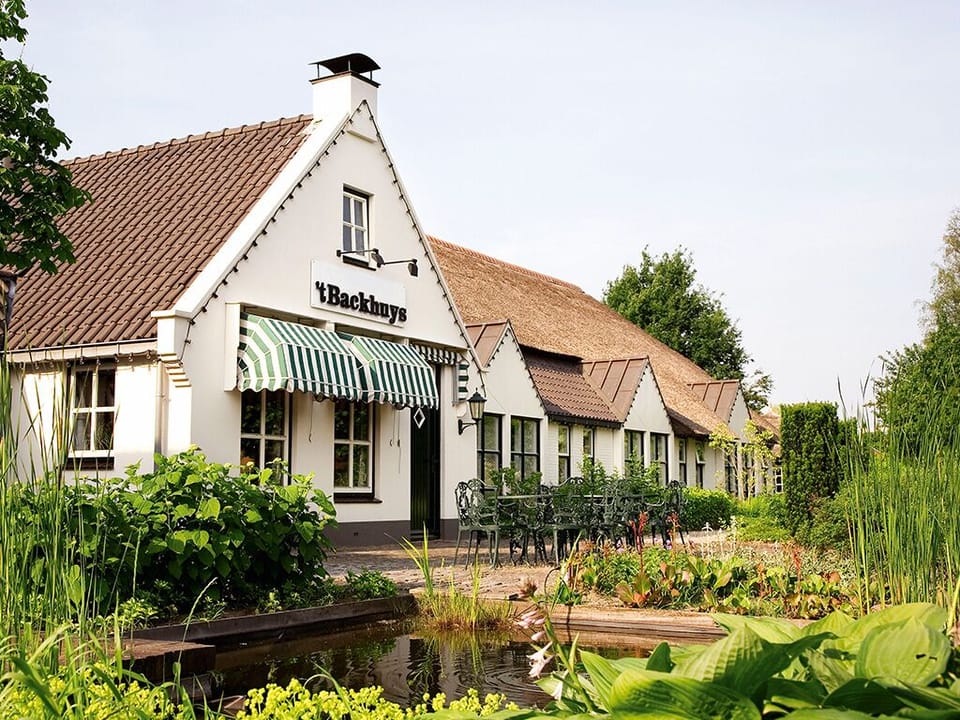 Wander past gardens and water features to your inviting stay.