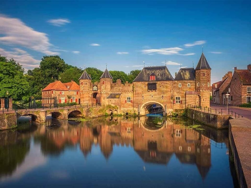 Stroll along paved paths between beautifully kept traditional buildings.