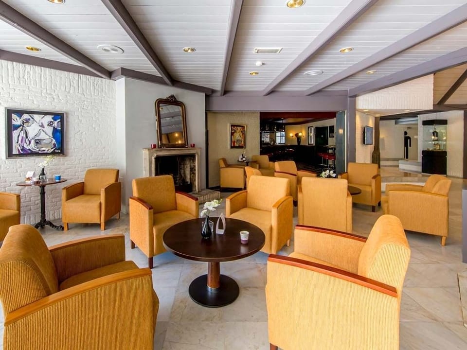Gather in plush seating and enjoy relaxed conversation by the hearth