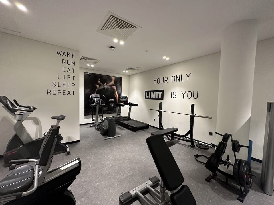 Recharge with a focused workout in the well-equipped fitness room.