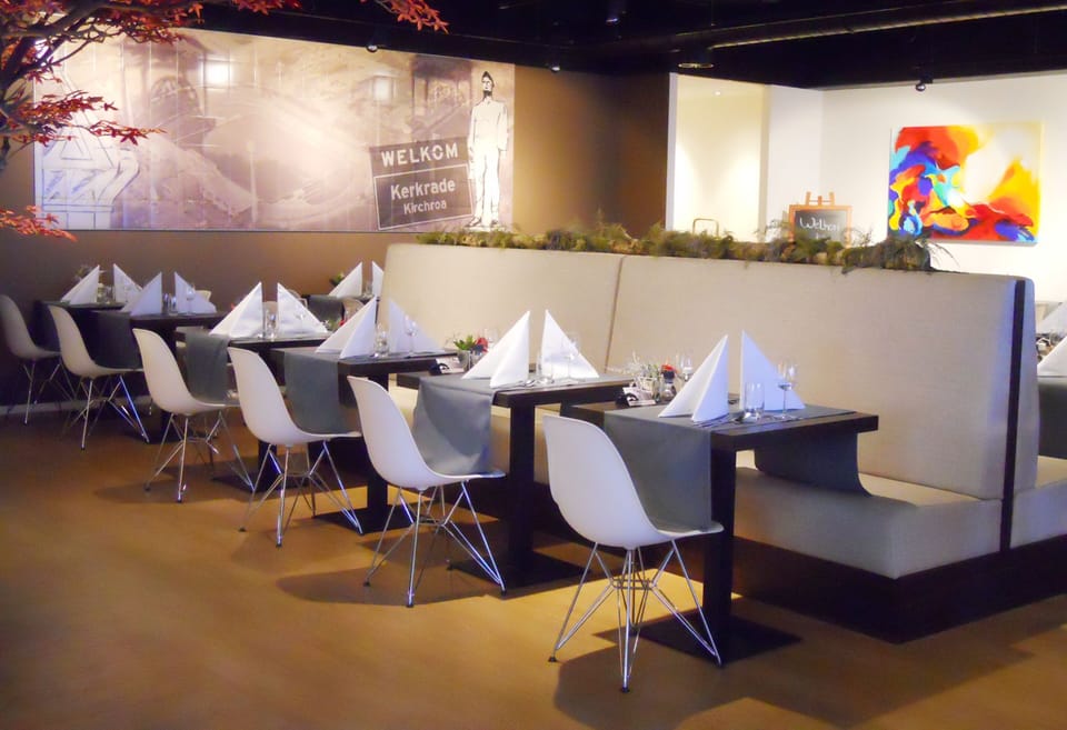 Gather for a relaxed dinner in stylish, contemporary seating.