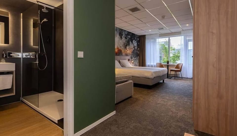 Unit with 2 Twin beds and 1 sofa bed. Exact unit will be assigned upon arrival. Views, colors, and decor may vary.
