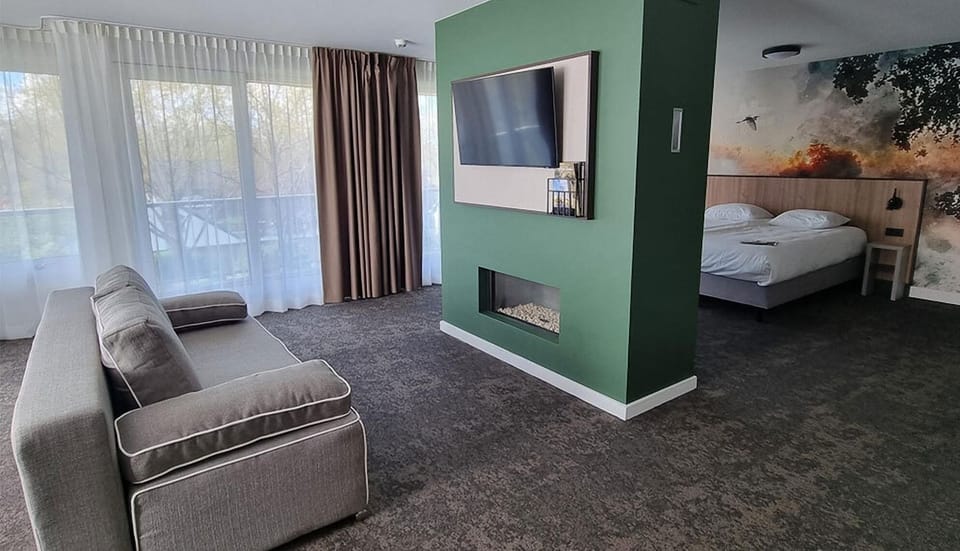 Unit with 2 Twin beds and 1 sofa bed. Exact unit will be assigned upon arrival. Views, colors, and decor may vary.