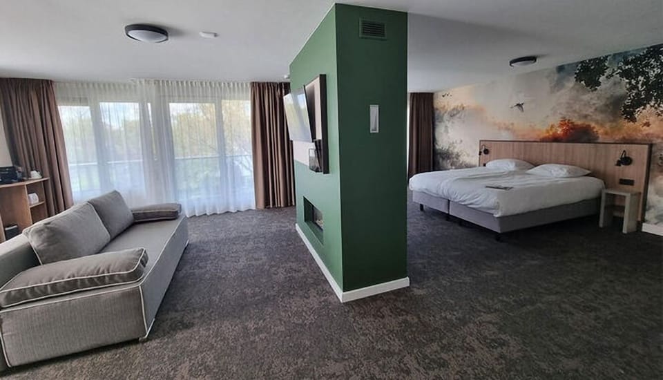 Unit with 2 Twin beds and 1 sofa bed. Exact unit will be assigned upon arrival. Views, colors, and decor may vary.