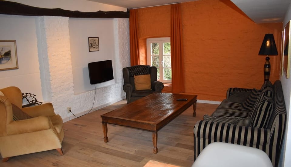 Living area. Exact unit will be assigned upon arrival. Views, colors, and decor may vary.