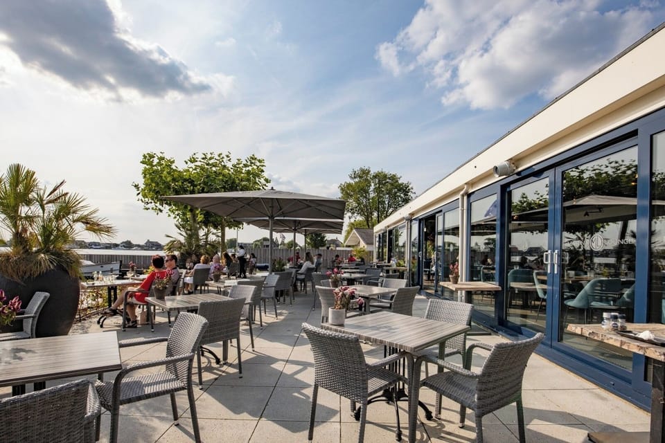 Sip and savor long lunches on the sunlit waterfront terrace.