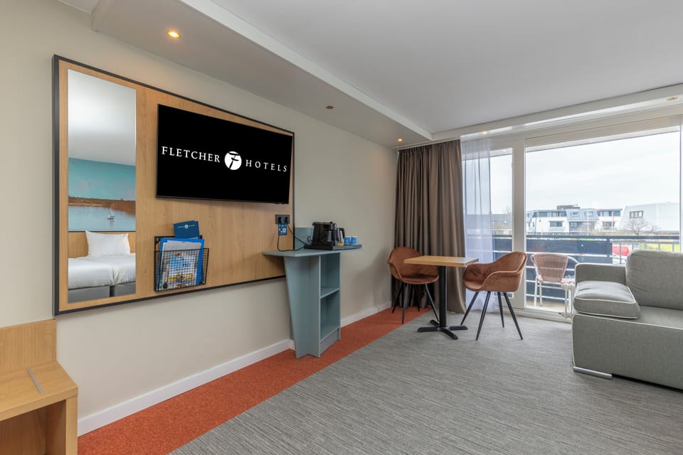 Plan your day at the table, then lounge by the window.