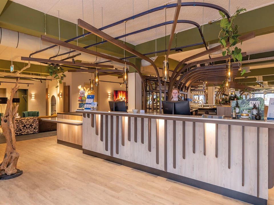 Arrive relaxed to a welcoming front desk and warm glow.