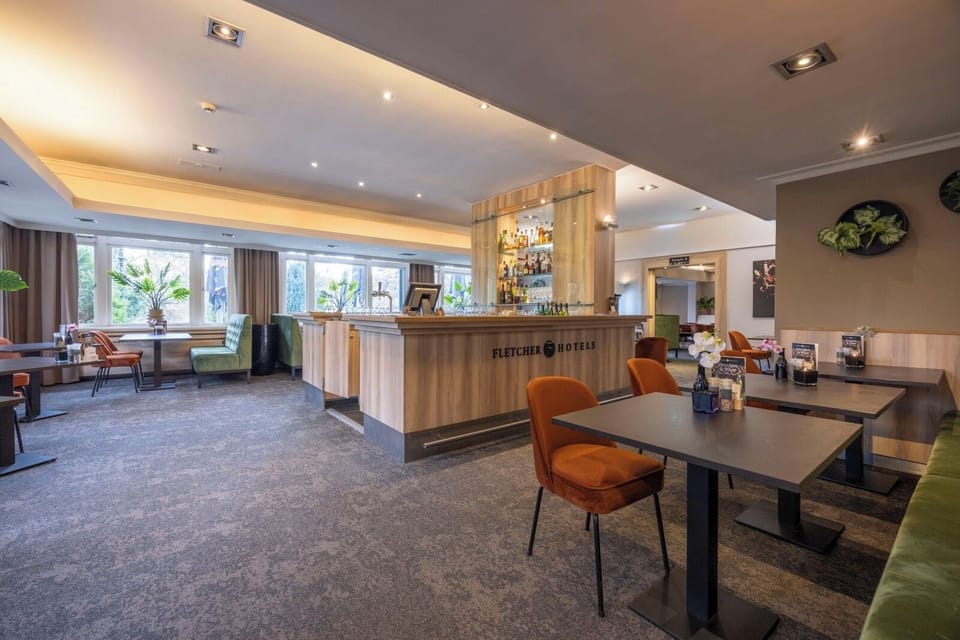 Gather for relaxed conversation in the airy lounge setting.