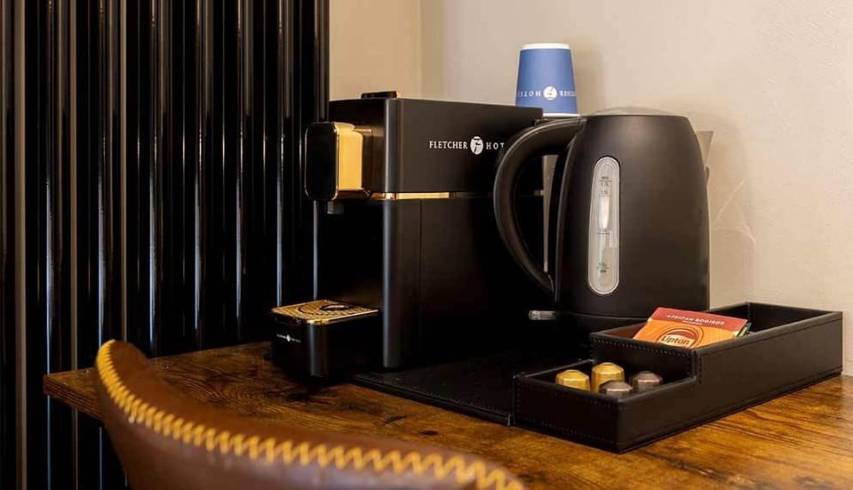 Start your morning with fresh coffee and tea in-room.