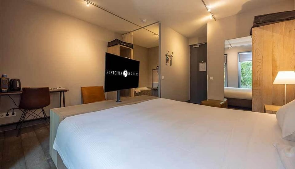 Stretch out after exploring, with workspace ready for tomorrow.
