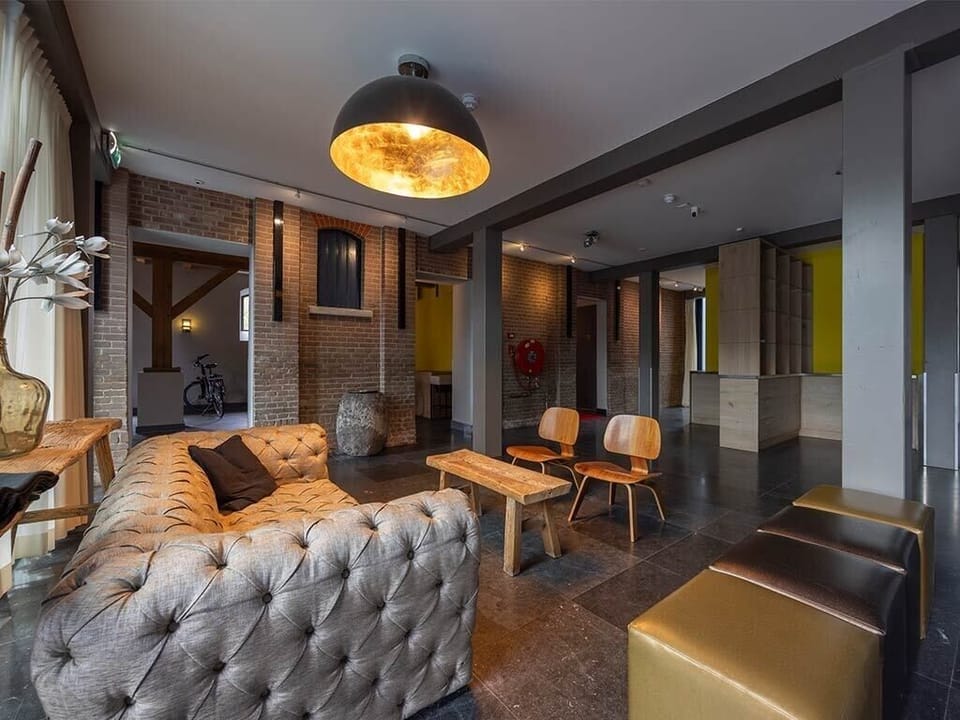 Step into an elegant lobby lounge with moody, boutique vibes.